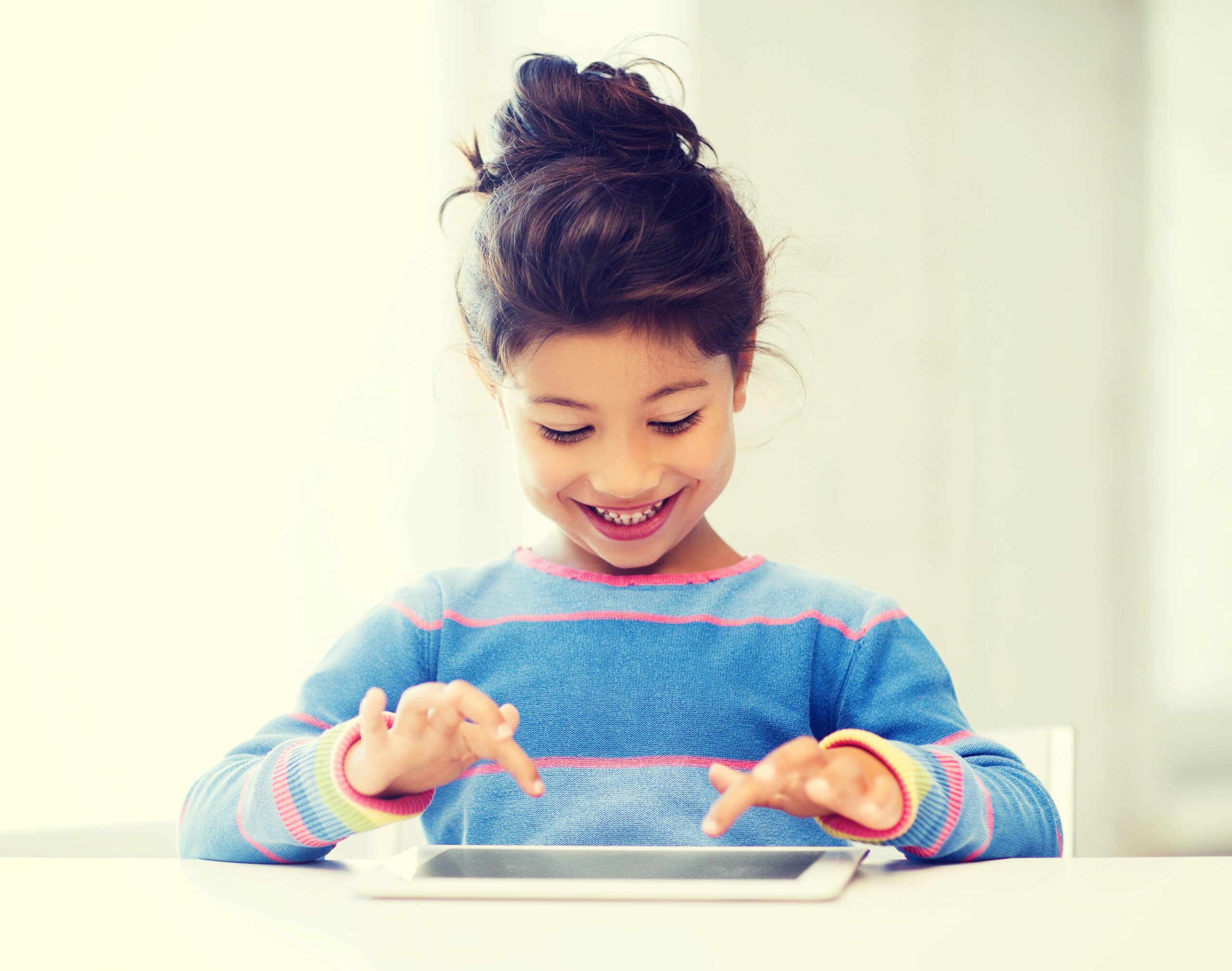 education, school, technology and internet concept - little student girl with tablet pc at home